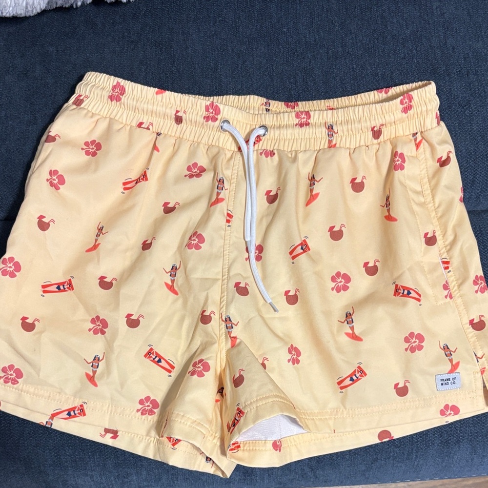 Yellow Swim Shorts with Red Surf Print
